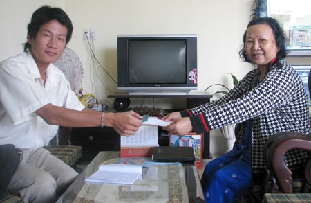 Một cô giáo về hưu ủng hộ xây cầu ở Quảng Bình - 1 Một cô giáo về hưu ủng hộ xây cầu ở Quảng Bình - 1