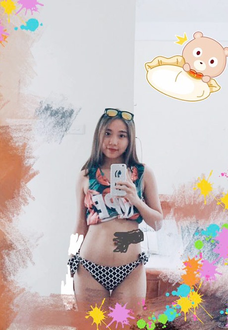 Trào lưu khoe "tay chạm rốn", đọ eo thon “đổ bộ” giới trẻ Việt - 6 Theo trào lưu, Miss Teen Trang Thiên vẽ hình bàn tay đặt lên bụng với lời tựa tôi đã làm được