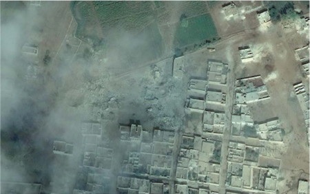 Giao tranh ác liệt tại điểm nóng Kobane nhìn từ vệ tinh - 6 Nhiều ngày giao tranh đã khiến những tòa nhà bị phá hủy,
chỉ còn lại những hố sâu do đạn pháo.