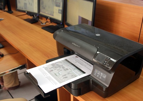 Hình ảnh phương tiện vi phạm được in ra lưu trong hồ sơ xử lý