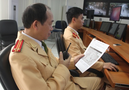 Hình ảnh phương tiện vi phạm được in ra lưu trong hồ sơ xử lý