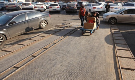 Trung Quốc: Mang hơn 300kg tiền xu tới gửi ngân hàng