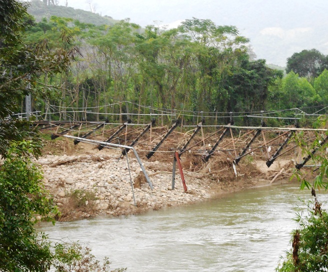 Cầu treo làng O5 thuộc xã Vĩnh Kim (huyện Vĩnh Thạnh) bị lũ cuốn trôi đợt lũ 2013 nay đã sửa xong