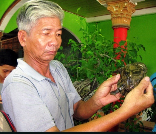 Ba ba hình mặt người được trả giá 100 triệu đồng? - 1 Con ba ba lạ có mai lạ, hoa văn giống mặt người.