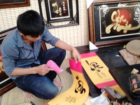 Một công cụ hong khô chữ hiện đại của ông đồ thế kỷ 21