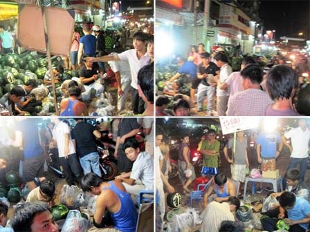 Không khí mua bán tấp nập ở hàng dưa hấu làm náo nhiệt một đoạn đường Thống Nhất.