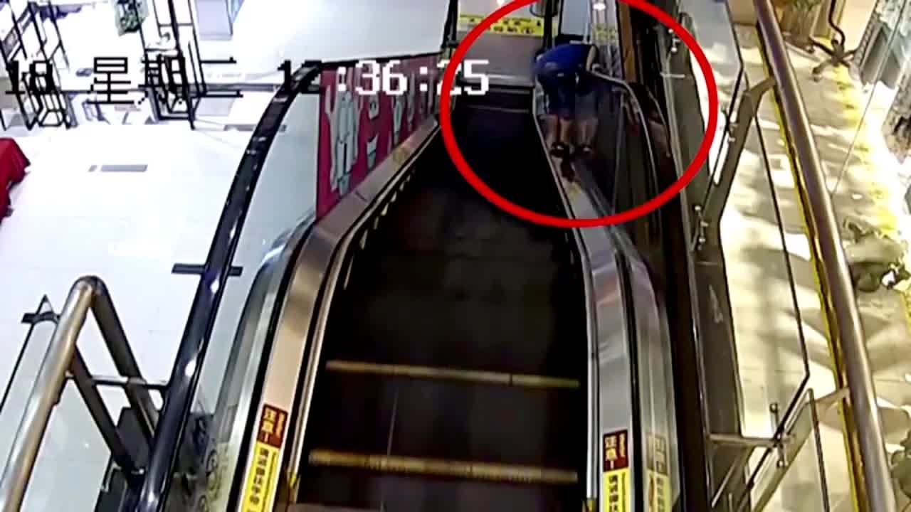 Clown Throwing Pie On Escalator