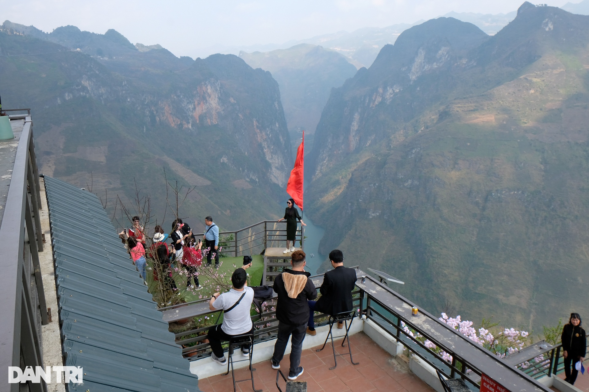 Busy tourists sailing across the deepest gorge in Southeast Asia in Ha Giang - 11