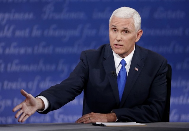 "Phó tướng" của Clinton ví ông Trump như "gã khùng" - 5
Mike Pence, phó tướng của ông Donald Trump (Ảnh: Reuters)