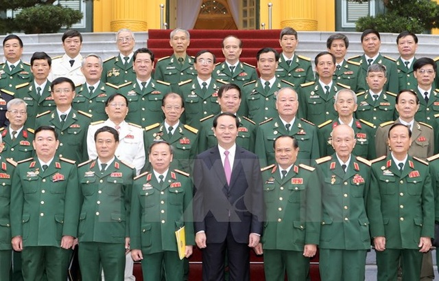 Chủ tịch nước gặp mặt đại biểu các thế hệ cán bộ Cục Tác chiến - 1
Chủ tịch nước Trần Đại Quang với các đại biểu tại buổi gặp mặt. (Ảnh: Nhan Sáng/TTXVN)