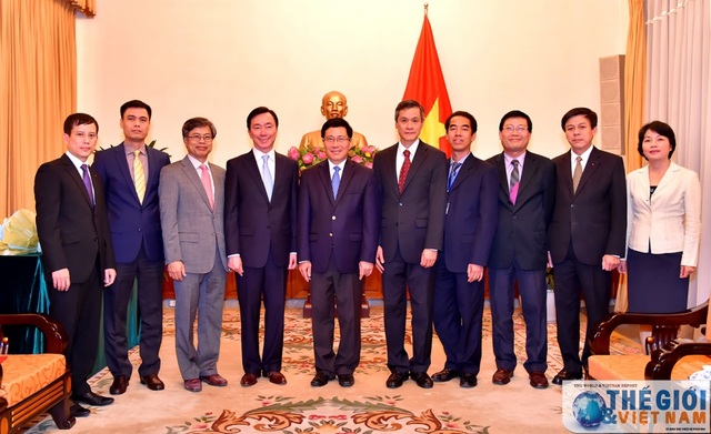 Điều động, bổ nhiệm nhân sự chủ chốt Bộ Ngoại giao - 1 Phó Thủ tướng, Bộ trưởng Ngoại giao Phạm Bình Minh cùng các đại biểu dự lễ trao quyết định. Ảnh TGVN