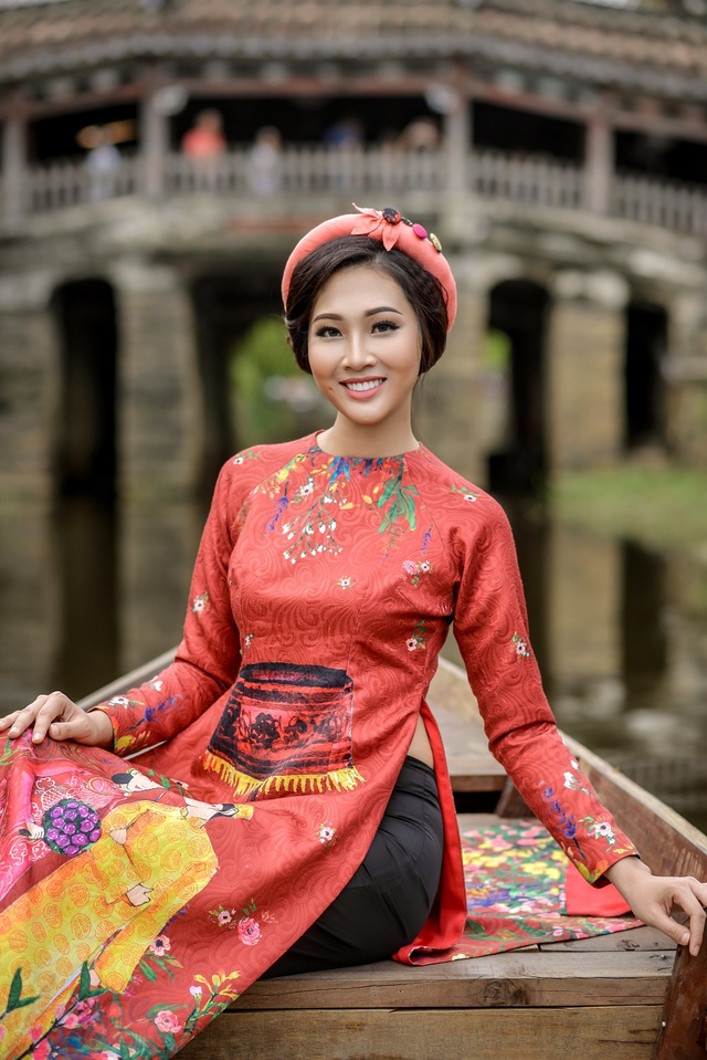 Diệu Ngọc duyên dáng giữa đất trời Hội An - 8 Áo dài vải gấm với sắc cam đất mang lại vẻ ngoài vừa trẻ trung cho Diệu Ngọc.