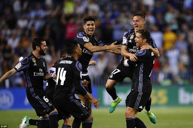 C.Ronaldo lập công, Real Madrid lên ngôi vô địch La Liga - 3
Thắng Malaga 2-0 tại La Rosaleda, Real Madrid lên ngôi vô địch La Liga
