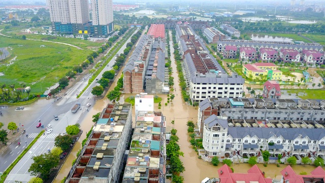 Nhiều khu đô thị chìm trong biển nước sau cơn mưa lớn ở Hà Nội - 3 Cảnh ngập mênh mông tại khu vực An Khánh, huyện Hoài Đức, Hà Nội