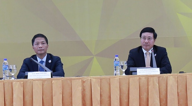 Lãnh đạo 21 nền kinh tế APEC xem xét văn kiện quan trọng nào tại Đà Nẵng? - 1 Phó Thủ tướng, Bộ trưởng Ngoại giao Phạm Bình Minh và Bộ trưởng Công Thương Trần Tuấn Anh chủ trì họp báo quốc tế chiều 9/11 về AMM