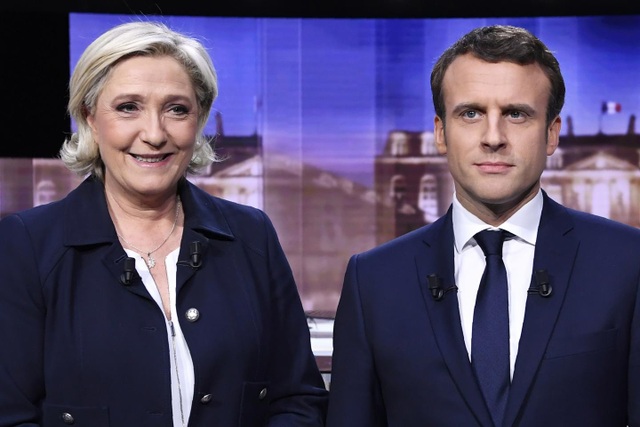 Hai ứng cử viên sáng giá cho ghế Tổng thống Pháp Emmanuel Macron và Marine Le Pen (Ảnh: Reuters)