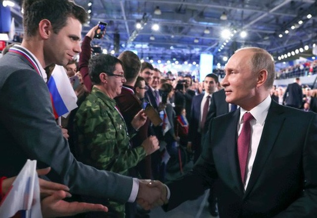 Nga thuê cảng quân sự Syria thêm 49 năm - 1
Ông Putin (phải) tham dự một hội nghị ở Moscow hôm 19-12. Ảnh: AP