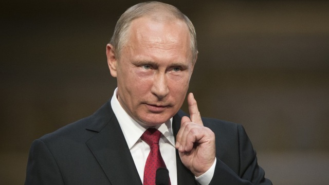 Tổng thống Putin: Cáo buộc Nga can thiệp bầu cử Mỹ là chuyện hư cấu - 1 Tổng thống Nga Vladimir Putin (Ảnh: RT)