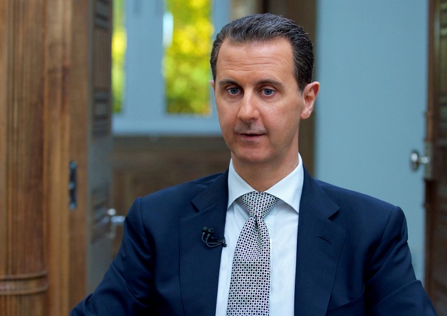 Syria tính mua hệ thống phòng không mới nhất của Nga để đối phó Mỹ - 1 Tổng thống Syria Bashar al-Assad (Ảnh: Reuters)
