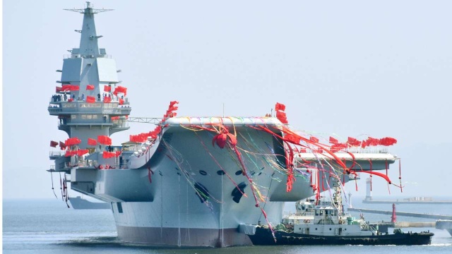 Vấn nạn tham nhũng có thể "ngáng đường" Trung Quốc hiện đại hóa quân đội - 1
Tàu sân bay nội địa của Trung Quốc được hạ thủy hôm 26/4 (Ảnh: Kyodo)
