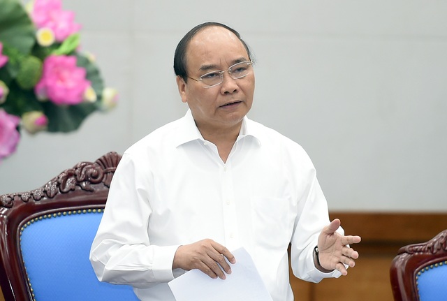 Thủ tướng “sốt ruột” với 5.719 giấy phép con - 1 Thủ tướng yêu cầu 2017 phải là năm giảm phí cho doanh nghiệp (ảnh: VGP).