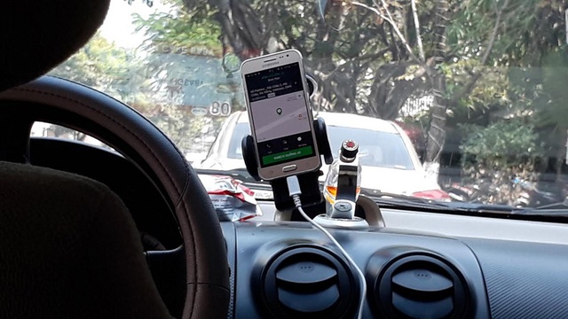 Thủ tướng trả lời đại biểu Dương Trung Quốc về Uber, Grab taxi - 1 Tính đến thời điểm này, Uber, Grab đã được chạy thử nghiệm ở Việt Nam 1,5 năm.