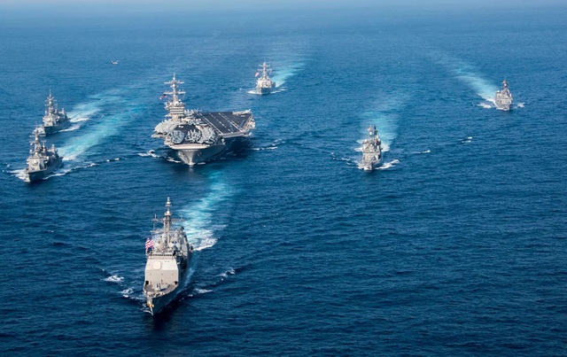 Triều Tiên “tố” Mỹ mang chiến tranh hạt nhân tới khu vực - 1 Nhóm tác chiến tàu sân bay USS Carl Vinson của Hải quân Mỹ (Ảnh: The Nation)