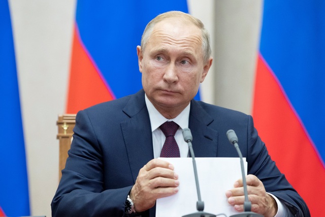 Tổng thống Putin tuyên bố sẽ phi đô la hóa nền kinh tế Nga - 1 Tổng thống Putin (Ảnh: Reuters)