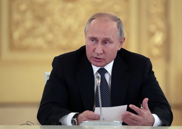 Tổng thống Putin cảnh báo trừng phạt bất cứ nước nào cho Mỹ triển khai tên lửa hạt nhân - 1
Tổng thống Nga Vladimir Putin cảnh báo sẽ đáp trả và đáp trả nhanh chóng, hiệu quả nếu Mỹ rút khỏi Hiệp ước lực lượng hạt nhân tầm trung INF. (Ảnh minh họa: Reuters)