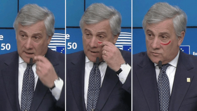Chủ tịch Nghị viện châu Âu Antonio Tajani vẽ một đường cong bằng son đỏ lên mặt (Ảnh: EVN)