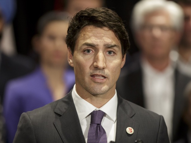Canada lên tiếng sau khi Tổng thống Mỹ ngỏ ý can thiệp vụ sếp Huawei - 1
Thủ tướng Canada Justin Trudeau (Ảnh: Reuters)