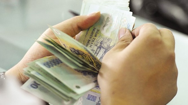 Thưởng Tết ở Hà Nội mức thấp nhất là 300.000 đồng - Ảnh 1. Thưởng Tết ở Hà Nội mức thấp nhất là 300.000 đồng - Ảnh 1.