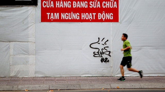 Đường phố Sài Gòn “say ngủ” ngày đầu năm - 8 Mọi thứ dừng hoạt động, chỉ còn những “thói quen” hàng ngày
