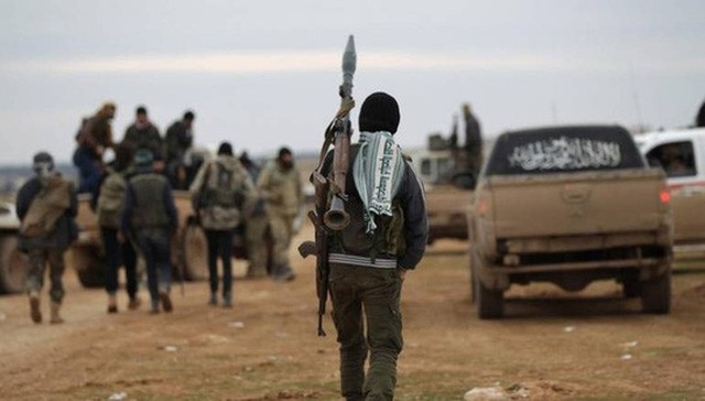 Còn lâu Syria mới yên - 1
Các tay súng Hay’at Tahrir al-Sham Ảnh: AL MASDAR NEWS