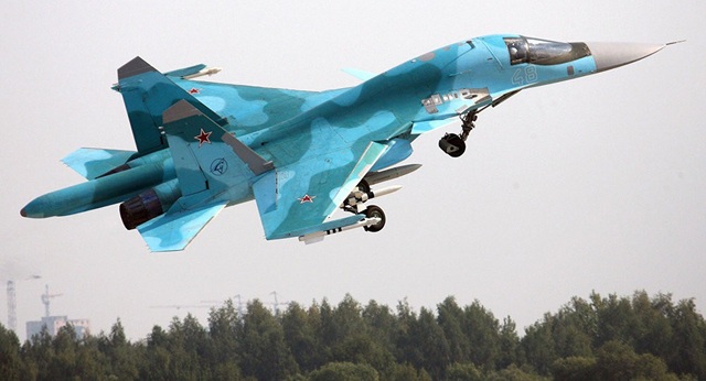 Khoảnh khắc “xe tăng bay” Su-34 khai hỏa tên lửa siêu thanh - 1 Máy bay ném bom chiến đấu Su-34 (Ảnh: Sputnik)