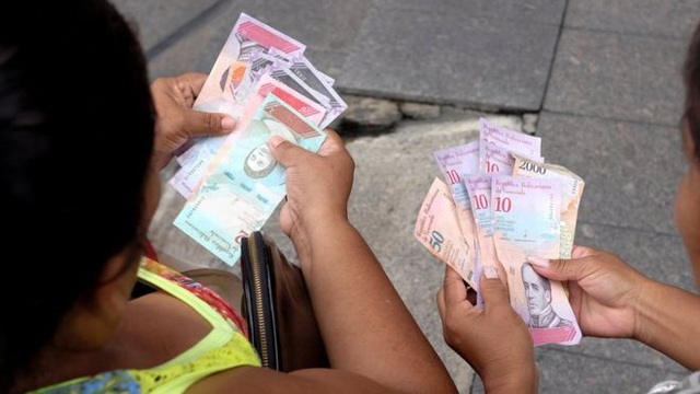 Venezuela "tê liệt" sau phát hành tiền mới - 1
Đồng nội tệ mới của Venezuela chính thức đưa vào lưu thông từ ngày 20/8. (Ảnh: Reuters)