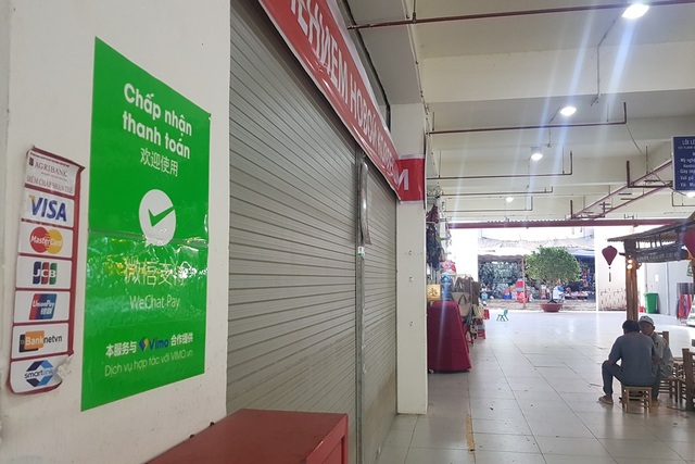 Tiểu thương cũng nhận thanh toán qua Wechat Pay - 1 Tiểu thương Chợ Đầm Nha Trang cũng chấp nhận thanh toán qua Wechat Pay với khách Trung Quốc