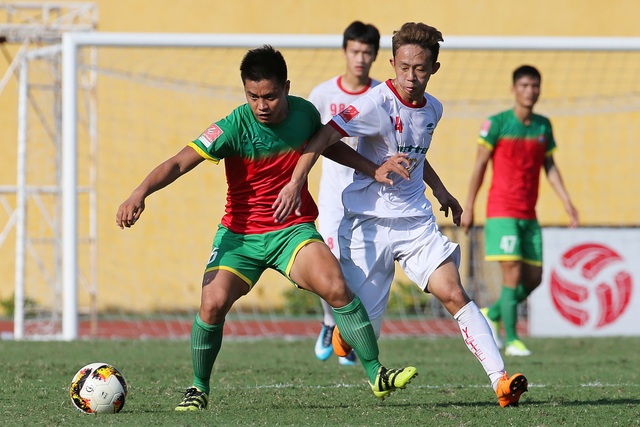 Viettel lên hạng, tượng đài Thể Công trở lại V-League - 1
Viettel (trắng) giành chiến thắng 2-0 trước Bình Phước để vô địch giải hạng Nhất