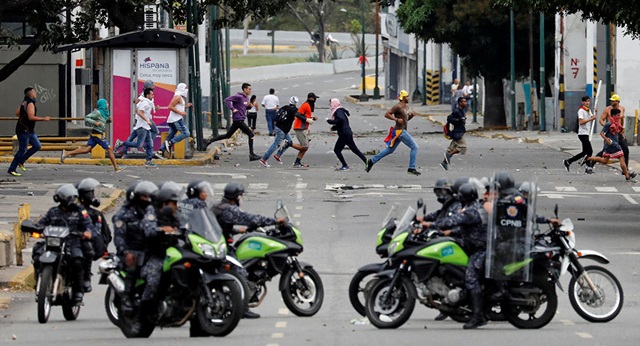 Biểu tình bùng phát tại Venezuela sau khi lãnh đạo đối lập tự nhận là tổng thống lâm thời - Ảnh minh hoạ 7