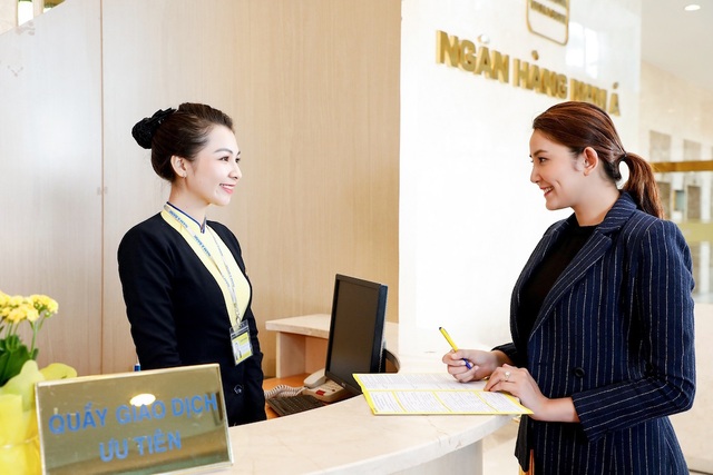Lợi nhuận ngân hàng tăng mạnh khi nợ xấu giảm - 2 Lợi nhuận ngân hàng tăng mạnh khi nợ xấu giảm - 2