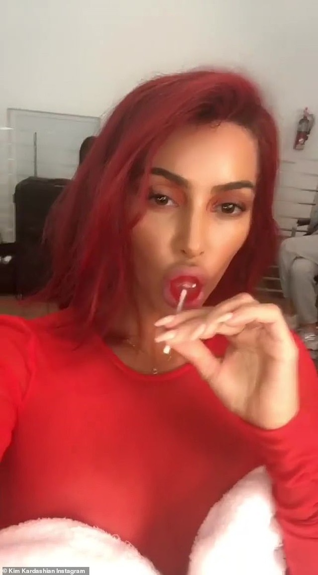 Kim Kardashian gây bất ngờ với tóc đỏ rực - 5