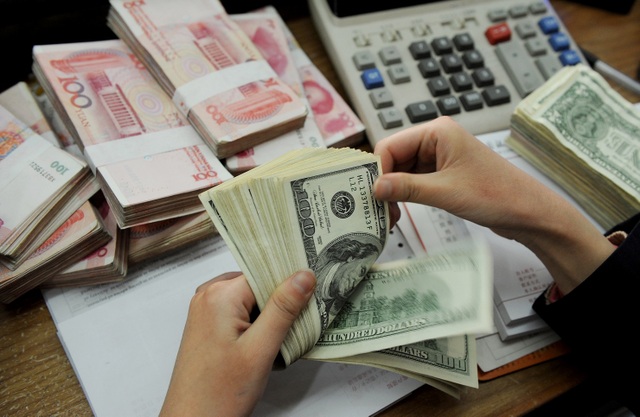 Trung Quốc liên tục phá giá nhân dân tệ: Giới đầu tư Việt Nam theo sát diễn biến - 1