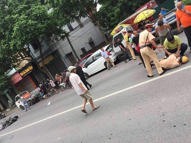 Hà Nội: Thanh niên ngổ ngáo tông gục Cảnh sát giao thông trên phố - 1 Hà Nội: Thanh niên ngổ ngáo tông gục Cảnh sát giao thông trên phố - 1