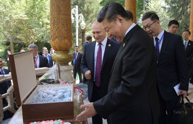 Ông Putin tặng kem cho ông Tập nhân dịp sinh nhật - Ảnh minh hoạ 3