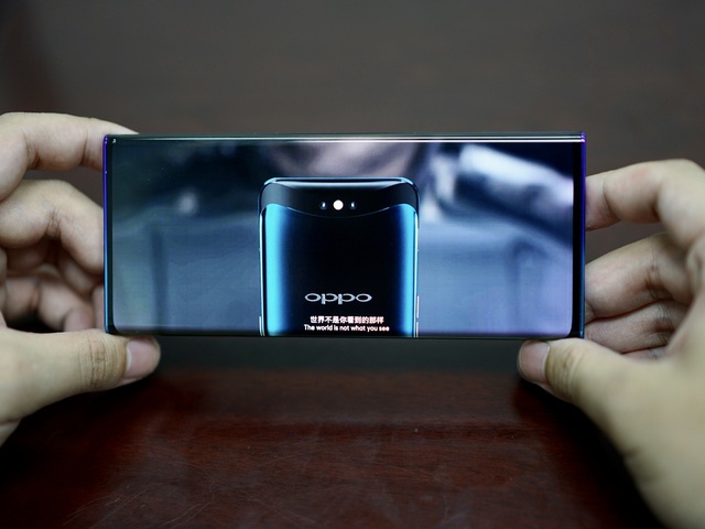 Oppo “khoe” nguyên mẫu smartphone màn hình siêu cong, không có phím bấm vật lý - Ảnh minh hoạ 7