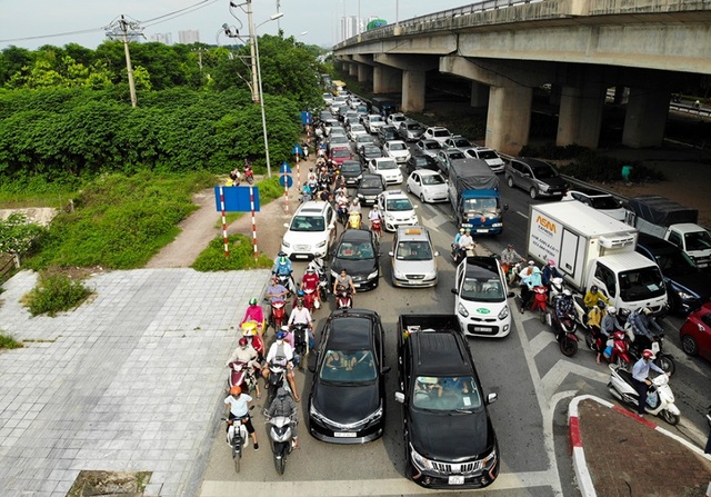 Cảnh đoàn xe ùn tắc hàng km ở cửa ngõ phía Nam Hà Nội - 5