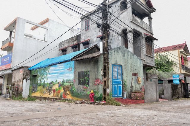 Bích họa lạ lẫm ở làng nông nghiệp ngoại thành Hà Nội - 11 Bích họa lạ lẫm ở làng nông nghiệp ngoại thành Hà Nội - 11