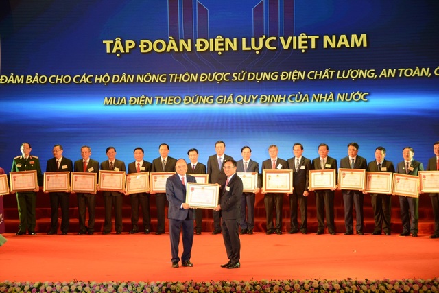 EVN đón nhận Huân chương Lao động hạng nhất vì những đóng góp cho chương trình xây dựng nông thôn mới - 1 EVN đón nhận Huân chương Lao động hạng nhất vì những đóng góp cho chương trình xây dựng nông thôn mới - 1