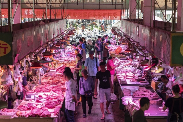 Ngân hàng Trung Quốc tặng thịt lợn để hút người gửi tiền - 1