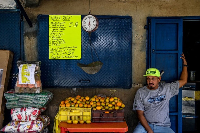 Vấn đề mới của Venezuela: Có quá nhiều tiền đô la - 3 Vấn đề mới của Venezuela: Có quá nhiều tiền đô la - 3